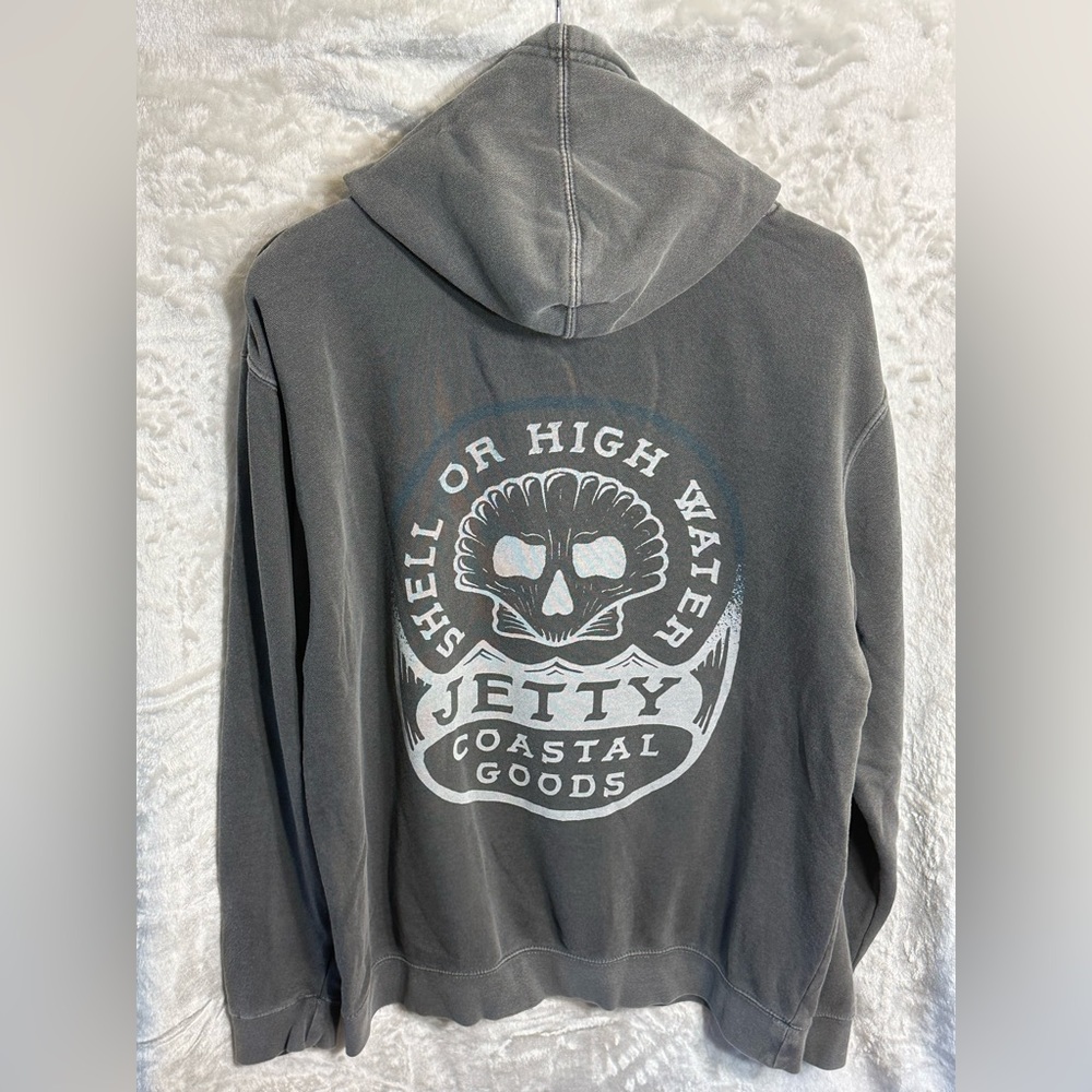 Jetty Men’s pullover graphic hoodie. Worn in feel. Used; like New.